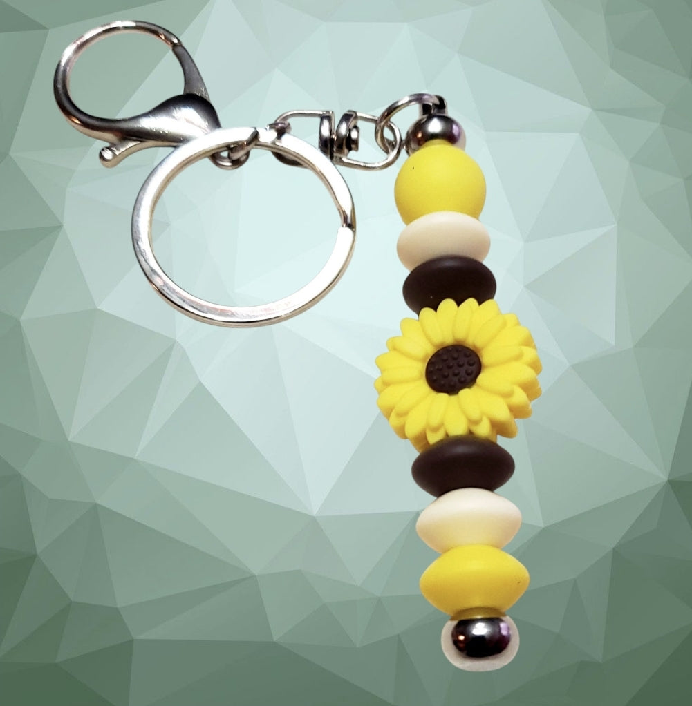 Venus Glam by Cardona Silicone Bag Tag Key Chain Yellow, Beige and Brown.