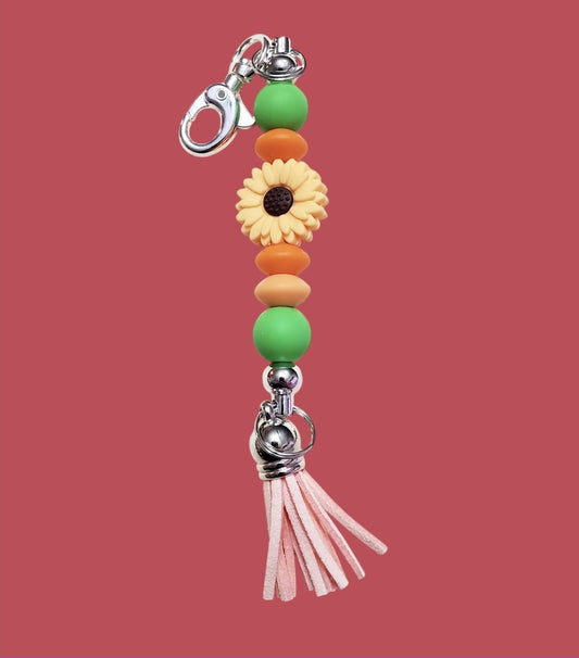 Venus Glam by Cardona Silicone Bag Tag Green Orange with Light Peach Sunflower Pendant and Tassel